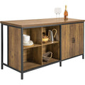 ?lot central de cuisine avec grand plan de travail, rangements integres et espace bar en finition marron vintage